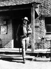 RIO BRAVO, 1959 directed by HOWARD HAWKS John Wayne (b/w photo)